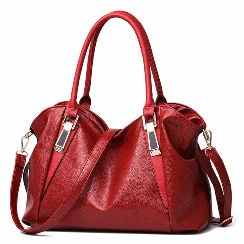 Fashionable Handbag, Available in Multiple Colors, Supports Three Carrying Modes: Handheld, Shoulder Back, And Crossbody. Multiple Internal Compartments And a Zippered Pocket. Metal Buckles And Shoulder Strap Additions on Both Sides of The Bag