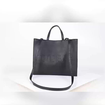 RAGSTO Women's Fashion Large Black Tote Bag, Embossed with "TOTE BAG" Lettering, High-Capacity Women's Shoulder/Underarm Bag, Work Bag, Lightweight and Durable Crossbody Handbag, Fixed Shoulder Strap, Ideal for Travel, Shopping, and Work