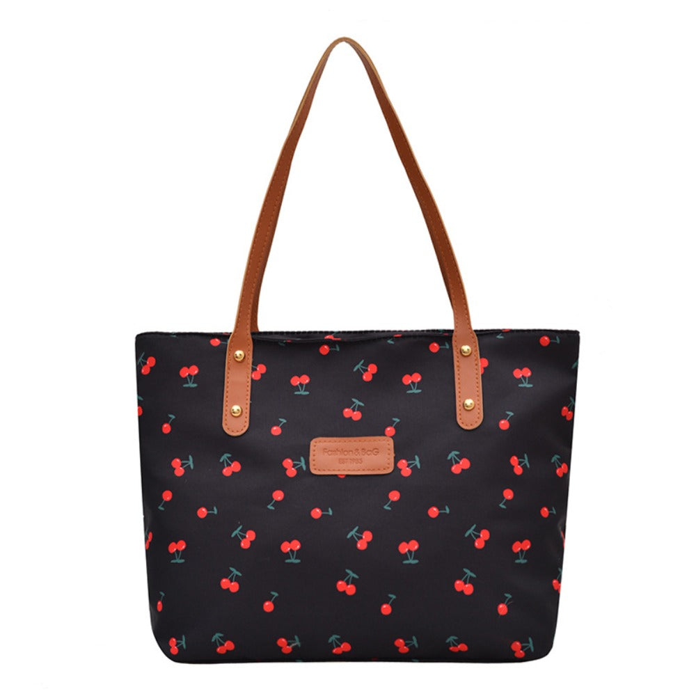 A Stylish And Spacious Handbag for Women, Perfect for Commuting, Featuring a Unique Printed Design That Can Be Used in Various Ways