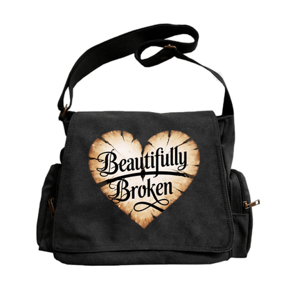 A Spacious Ladies' Shoulder Bag with a Flip-Top Design, Featuring a Vintage Style And a Heart-Shaped Crack Pattern Adorned with The Phrase 'Beautifully Broken'. It'S Perfect for Everyday Use And Travel