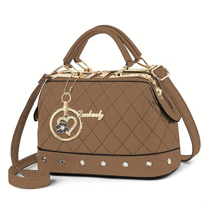 Black Quilted Boston Bag with Golden Hardware and Adjustable Strap- Elegant Heart-Shaped Rhinestone Accessories, Pattern Design, and Fashionable Rivet Details