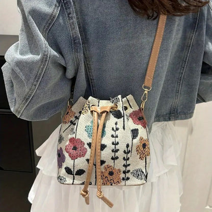 Elegant Floral Pattern Bucket Bag for Ladies: A handbag with ethnic style, featuring a zipper closure. It is suitable for both traveling and working, and can be used as a crossbody bag for outdoor leisure and commuting.