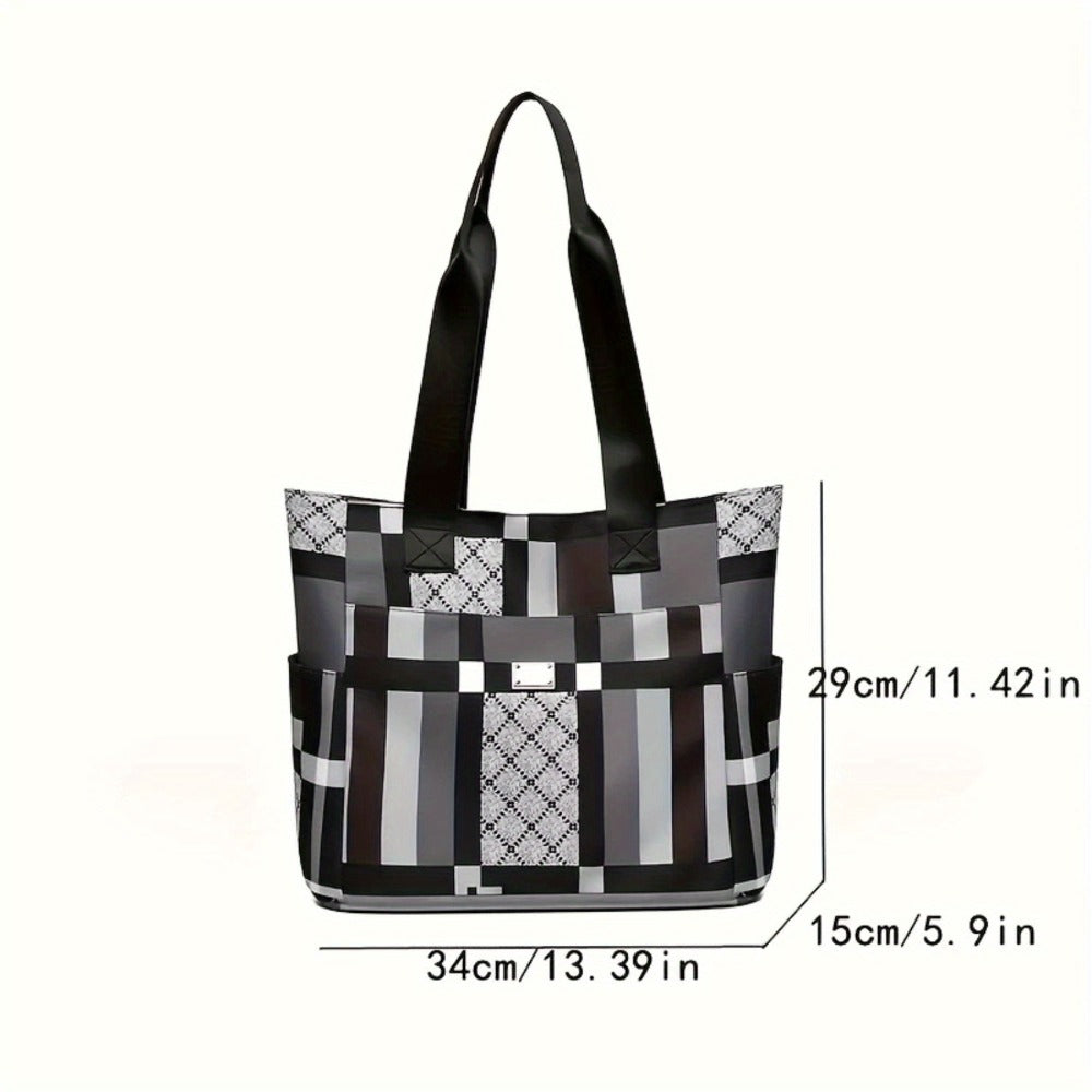A Geometric Design Tote Bag Made of Lightweight Nylon with a Zipper, It Is Foldable And Versatile, Offering Ample Space for School, Work, Or Travel