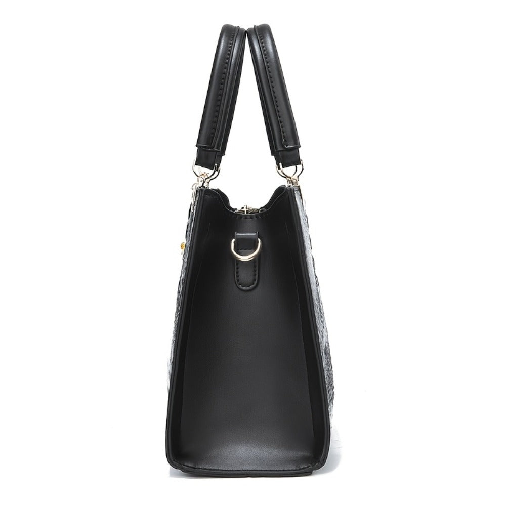 A Women'S Bag Featuring a Crocodile Print Texture, Designed for Both Hand And Crossbody Use, with a Heart-Shaped Hanging Decoration As a Finishing Touch