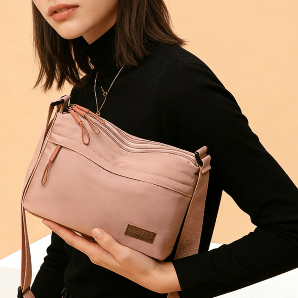 The Lady's Crossbody Bag Has a Large Capacity, Multiple Layers with Zippers for Closure, an Adjustable Shoulder Strap, Suitable for Casual Outings and Daily Use as a Handbag, and a Simple and Fashionable Crossbody Small Bag for Commuting.