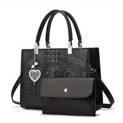 A Women'S Bag Featuring a Crocodile Print Texture, Designed for Both Hand And Crossbody Use, with a Heart-Shaped Hanging Decoration As a Finishing Touch