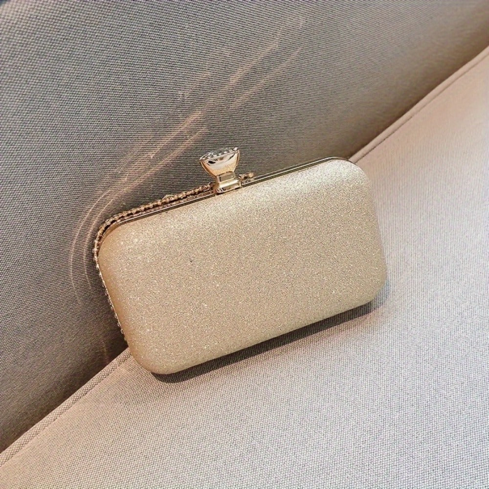 A Sparkling Evening Purse Adorned with Rhinestones And Sequins, Perfect for Vintage-Themed Weddings And Cocktail Parties