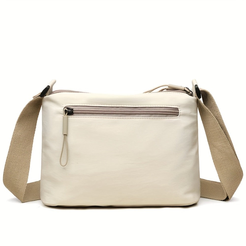 The Lady's Crossbody Bag Has a Large Capacity, Multiple Layers with Zippers for Closure, an Adjustable Shoulder Strap, Suitable for Casual Outings and Daily Use as a Handbag, and a Simple and Fashionable Crossbody Small Bag for Commuting.