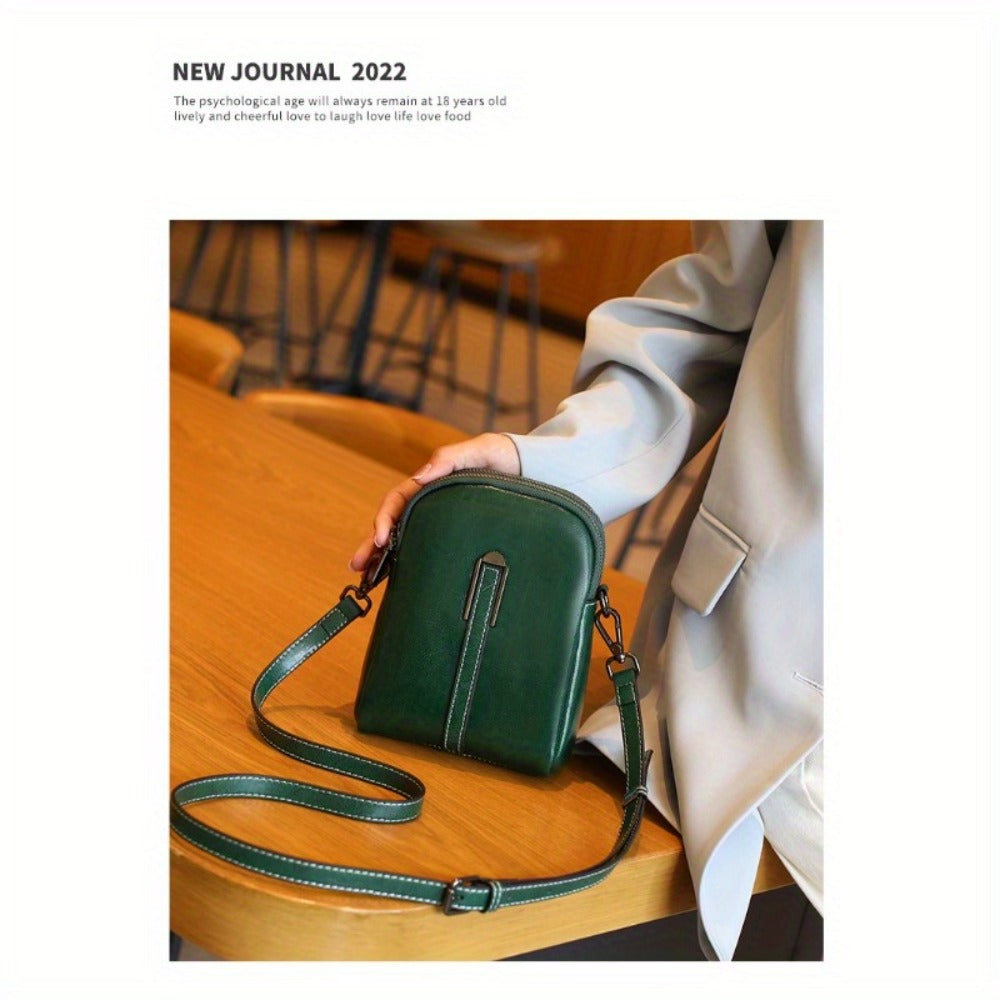 A Crossbody Bag Made of Authentic Leather for Women, Featuring a Small Size, an Adjustable Chain Strap, a Zip Closure, And a Stylish Look. Perfect for Both Everyday Use And Formal Events, Offered in Shades of Coffee Brown, Beige, And Black