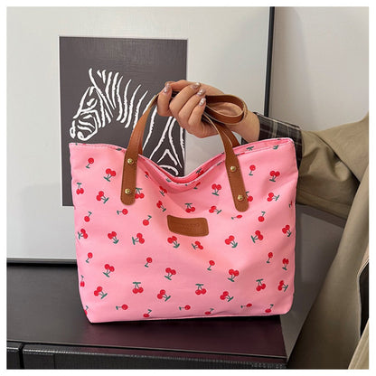 A Stylish And Spacious Handbag for Women, Perfect for Commuting, Featuring a Unique Printed Design That Can Be Used in Various Ways