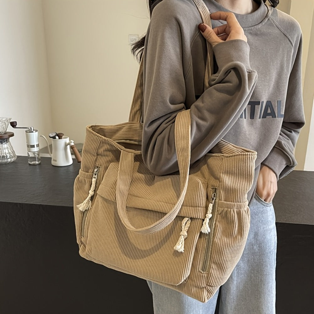 Spacious And Trendy Shoulder Bag for Women, Crafted from Corduroy Fabric. an Essential Addition to Your Wardrobe, It Includes Small Inner Pockets, a Zipper Closure, a Chic Minimalist Design for Underarm Wear, And Elastic Side Pockets