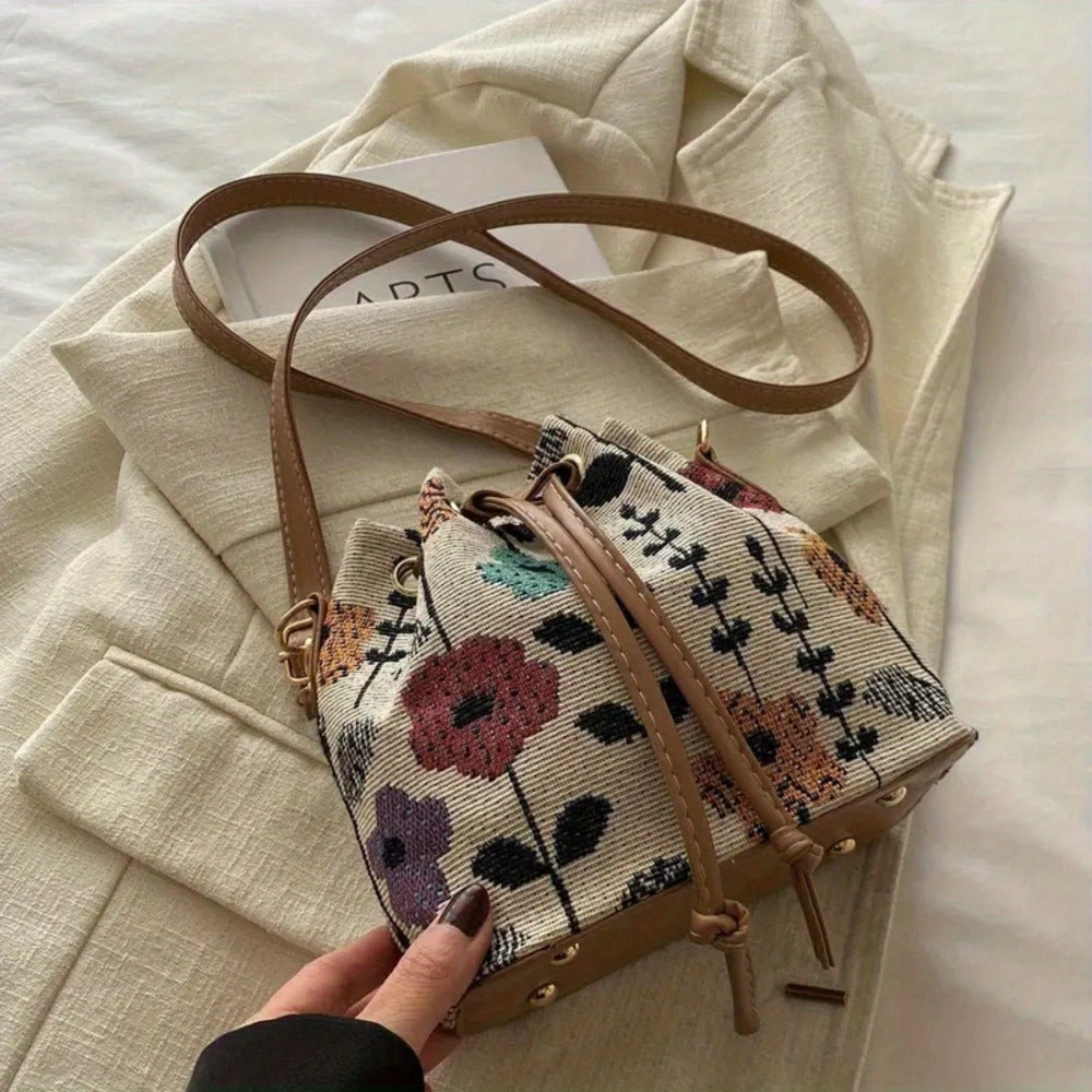 Elegant Floral Pattern Bucket Bag for Ladies: A handbag with ethnic style, featuring a zipper closure. It is suitable for both traveling and working, and can be used as a crossbody bag for outdoor leisure and commuting.