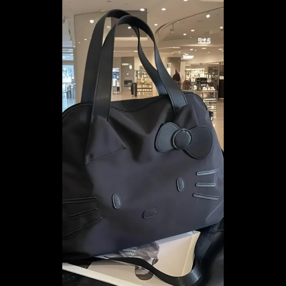 Sanrio Hello Kitty 2025 New Large Capacity Tote Bag - Detachable Shoulder Strap, Lightweight Nylon Material, Designed for Women, Black And White Color Scheme, Zipper Closure, Machine Washable, Suitable for Work, Commuting, And Travel, Playful Design