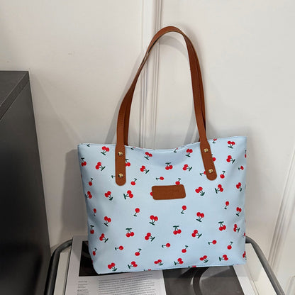 A Stylish And Spacious Handbag for Women, Perfect for Commuting, Featuring a Unique Printed Design That Can Be Used in Various Ways